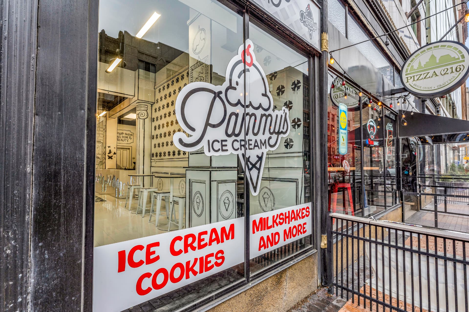 Pammy's Ice Cream storefront window on Euclid Avenue with the logo and red lettering